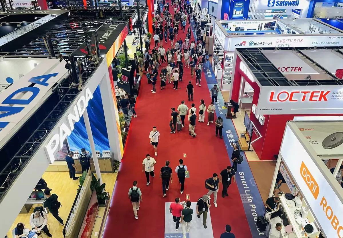 Visitors walking through a Canton Fair exhibition hall